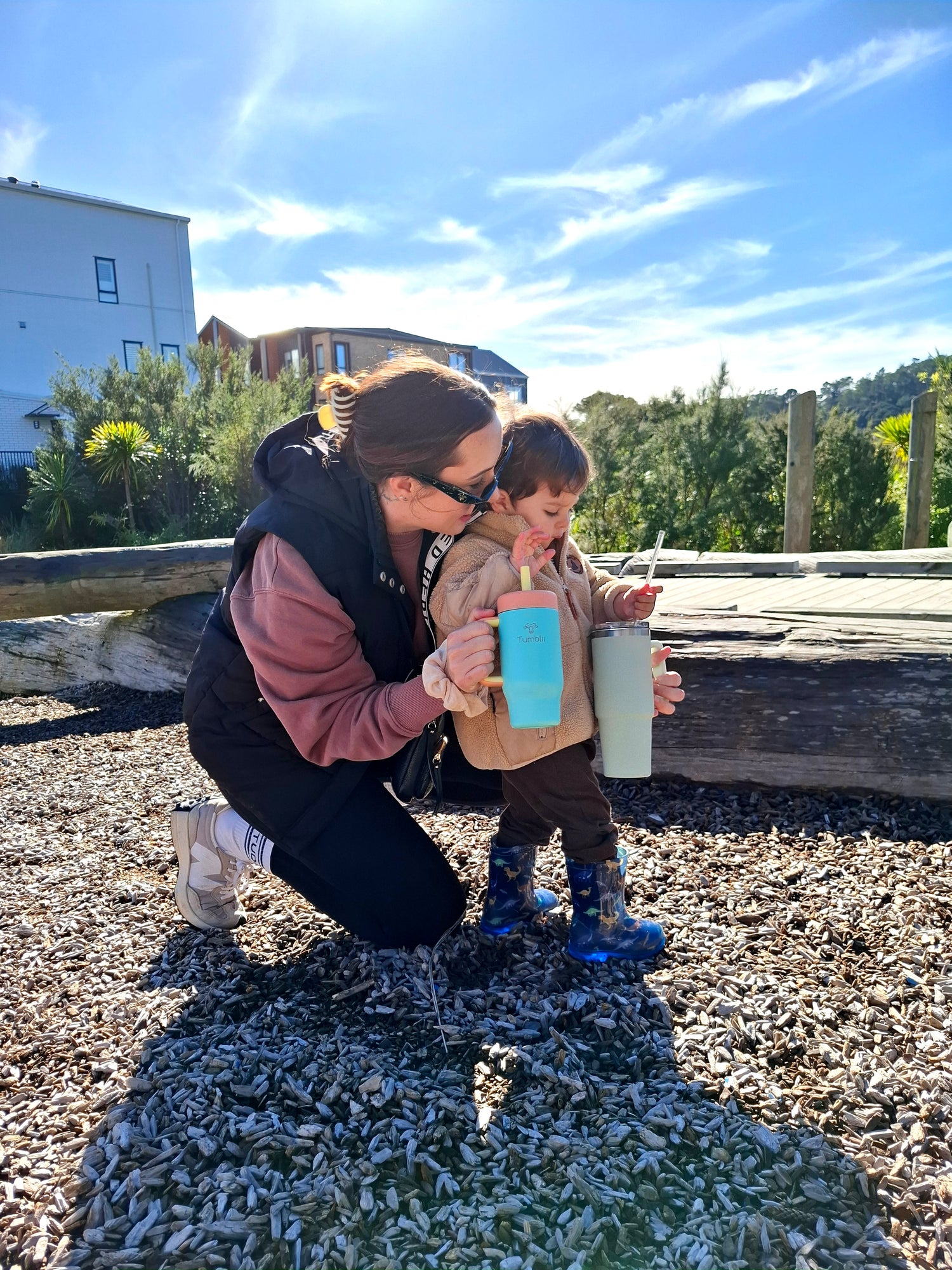 Mum and toddler with matching stainless steel tumblii tumbler cups with straws